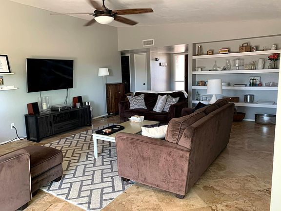 Large family room with built-in shelves