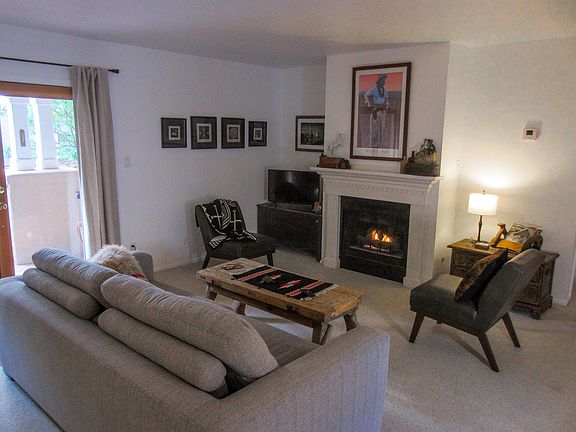 Living Room With Twin Day Bed and Double Swing-Open Patio Doors