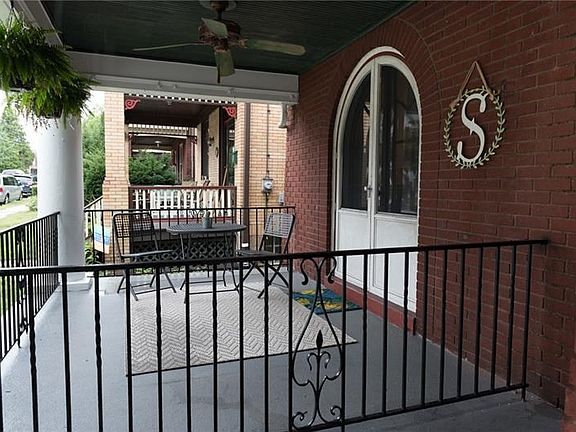 A big, beautiful porch perfect for enjoying the neighborhood.