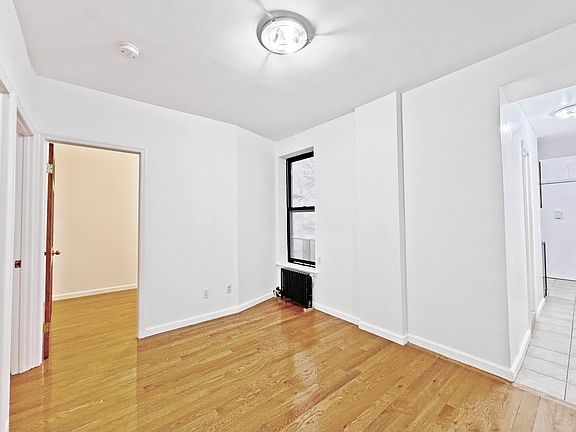 5th image of 332 E 15th St APT 3
