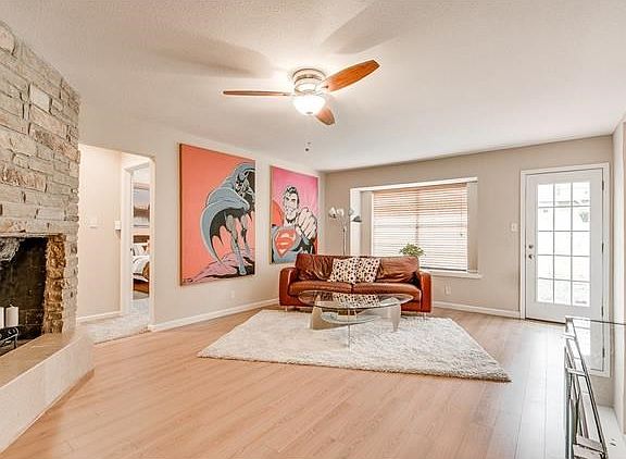 View of living room from entry way. Notice how much natural enters the home.