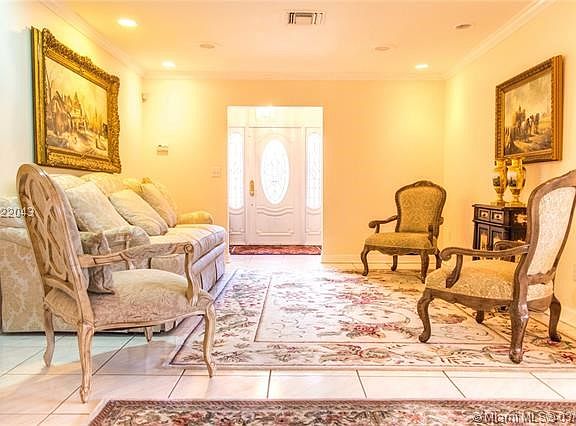 Formal Living room, with plenty of light and beautiful foyer entrance