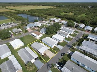 1223 Calusa Dr, Barefoot Bay, FL 32976