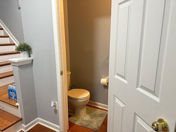 First level half bath and stairway