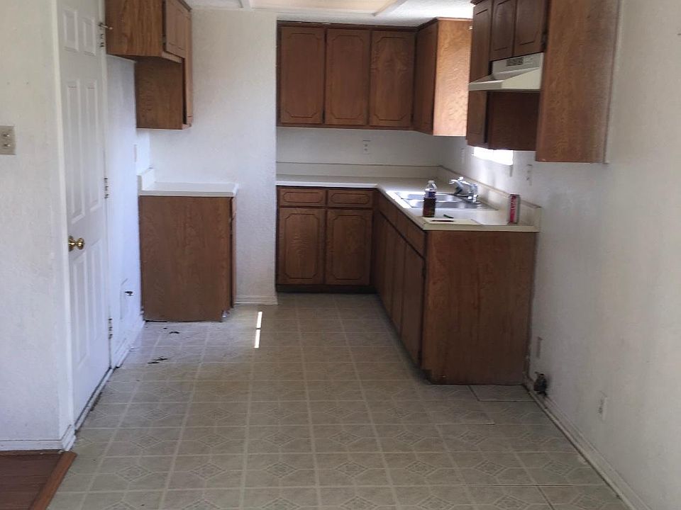 There is a gas stove that goes under the vent on the right.