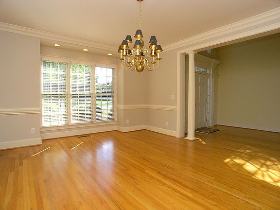 Formal Dining room-Columned entry and crown and chair rail molding