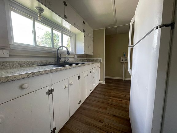Kitchen From looking towards laundry area.