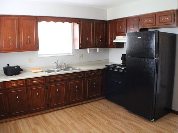 Substantial kitchen counter space and cabinets
