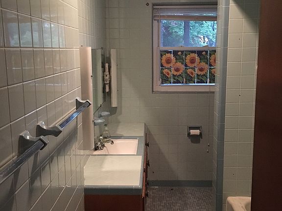 Large bathroom with bathtub and stand alone shower