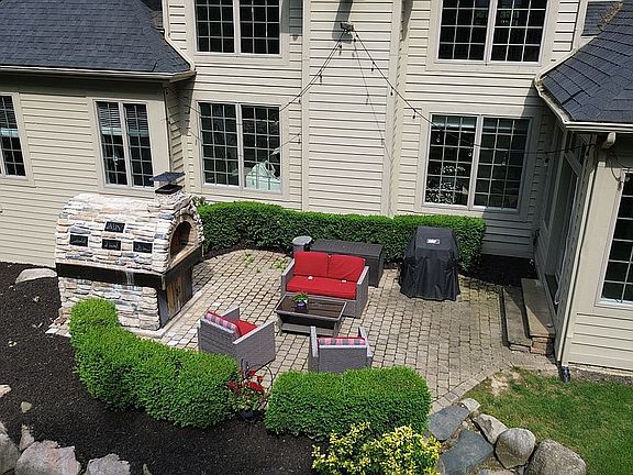 Patio with brick pizza oven