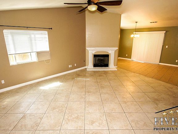 Another View of Living Area with Fireplace
