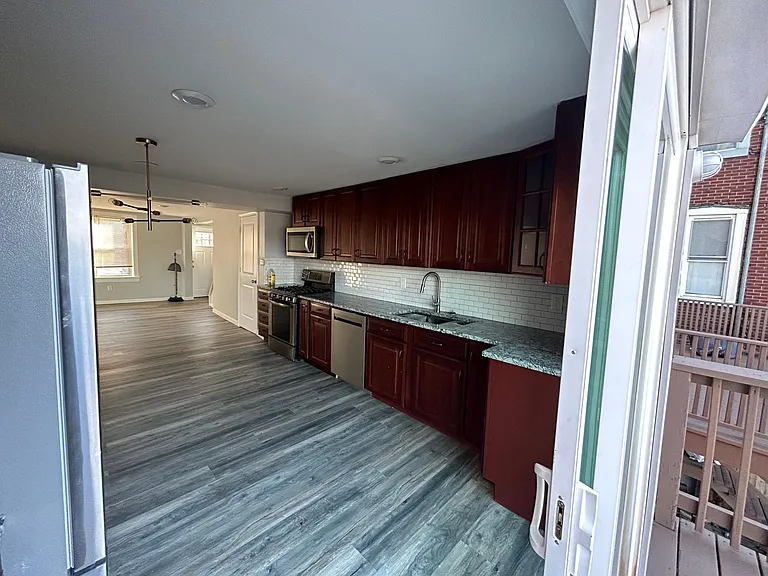 119 Pius St — Photo 32