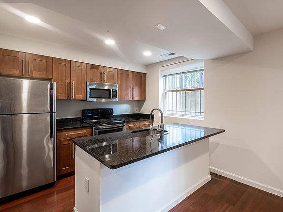 Kitchen with stainless steel appliances.