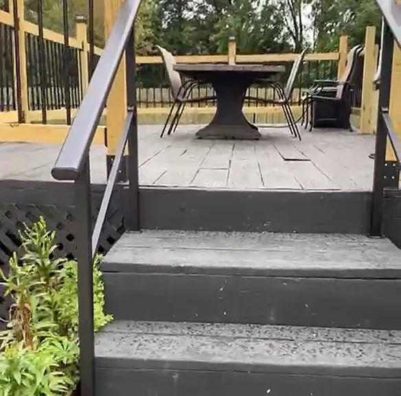 Back Porch / Patio with new modern railing and handrails.