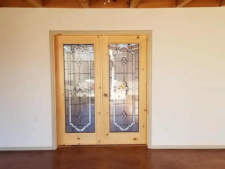View from Living Room into Master Suite -doors closed