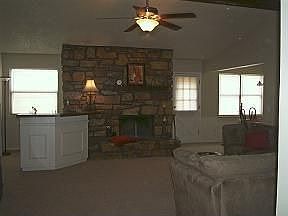 Living Room (Facing Fireplace and Wet Bar)