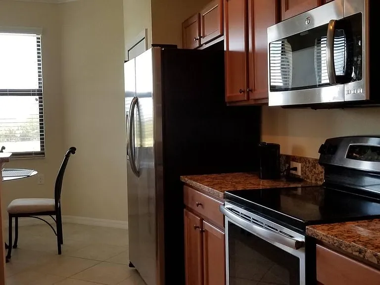 7015 River Hammock Dr #202 — Photo 2
