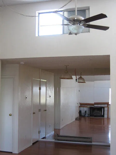 Dining area and vaulted ceiling in the living room.