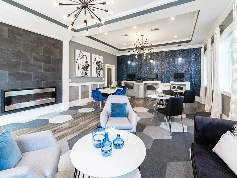 From remote work to resident events, this stylish business lounge offers workstations, plush seating, and a cozy modern fireplace, offering a great place to catch up on work.