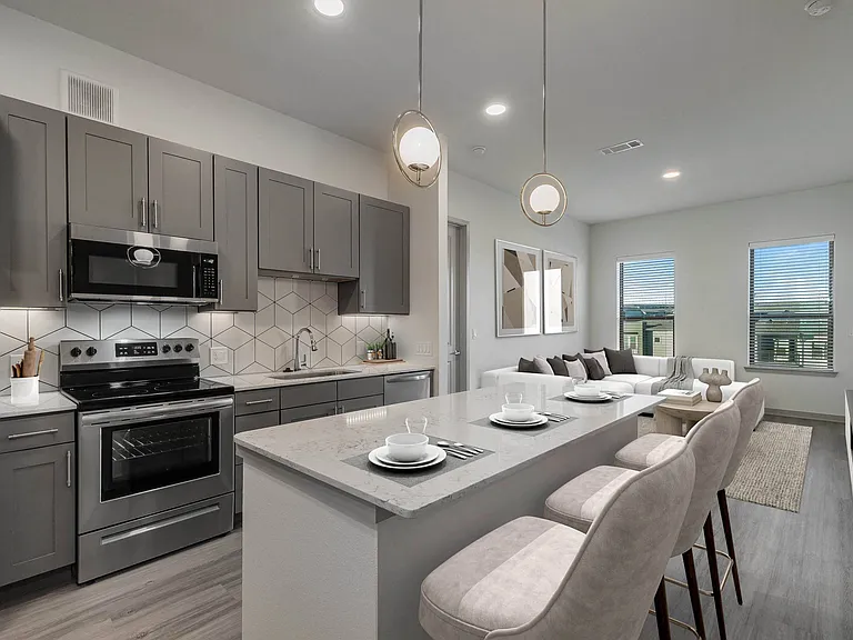 Modern kitchen with large island and barstool seating