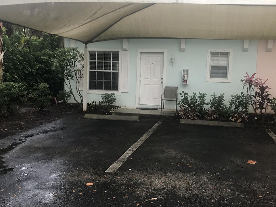 Front of the house with 2 parking spots
