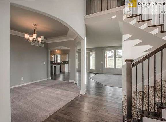 Gorgeous entry with hardwoods