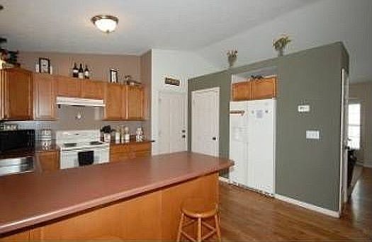 Kitchen with eat in bar