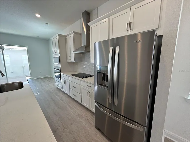 16902 Hamlin Oasis Loop — Photo 5