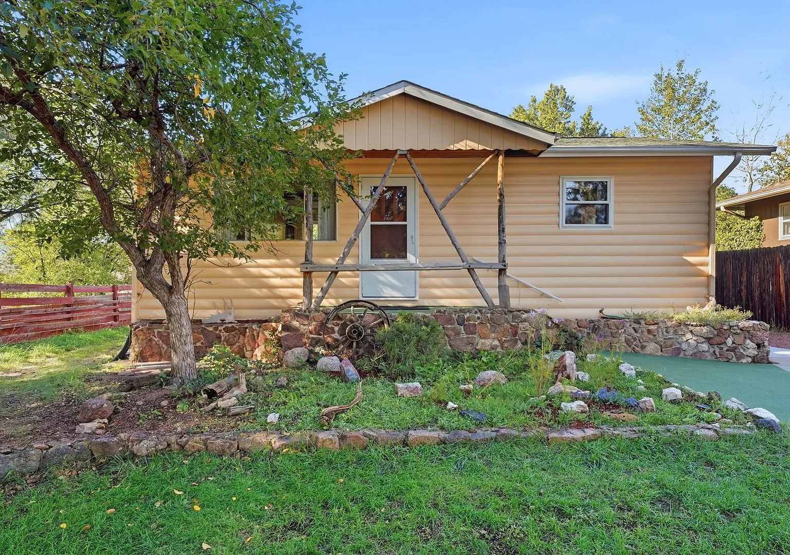 Glorious Mid-Century Property Near Garden of the Gods! — Photo 1