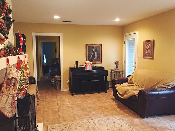 Living room; door to patio