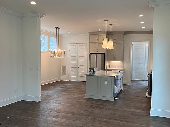 Beautiful kitchen and dining room leading from the living room