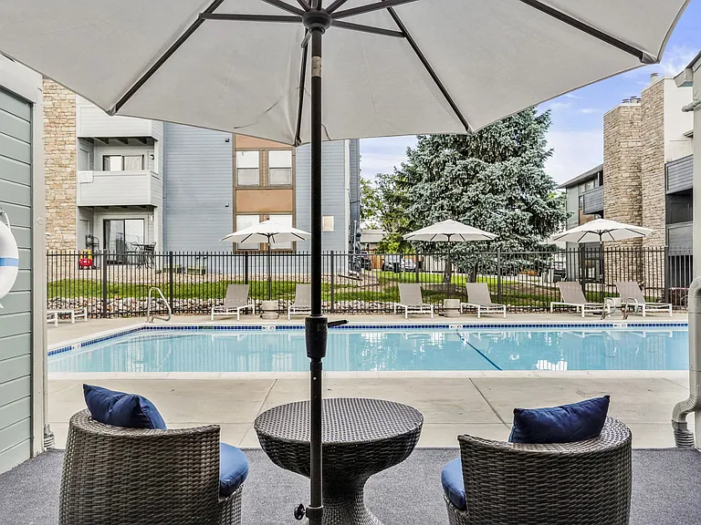 The Community Pool and Lounge Area at Hilltop View Apartments