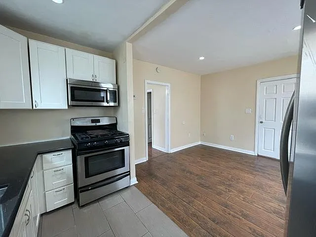 View of other side of living room from the other side of the kitchen