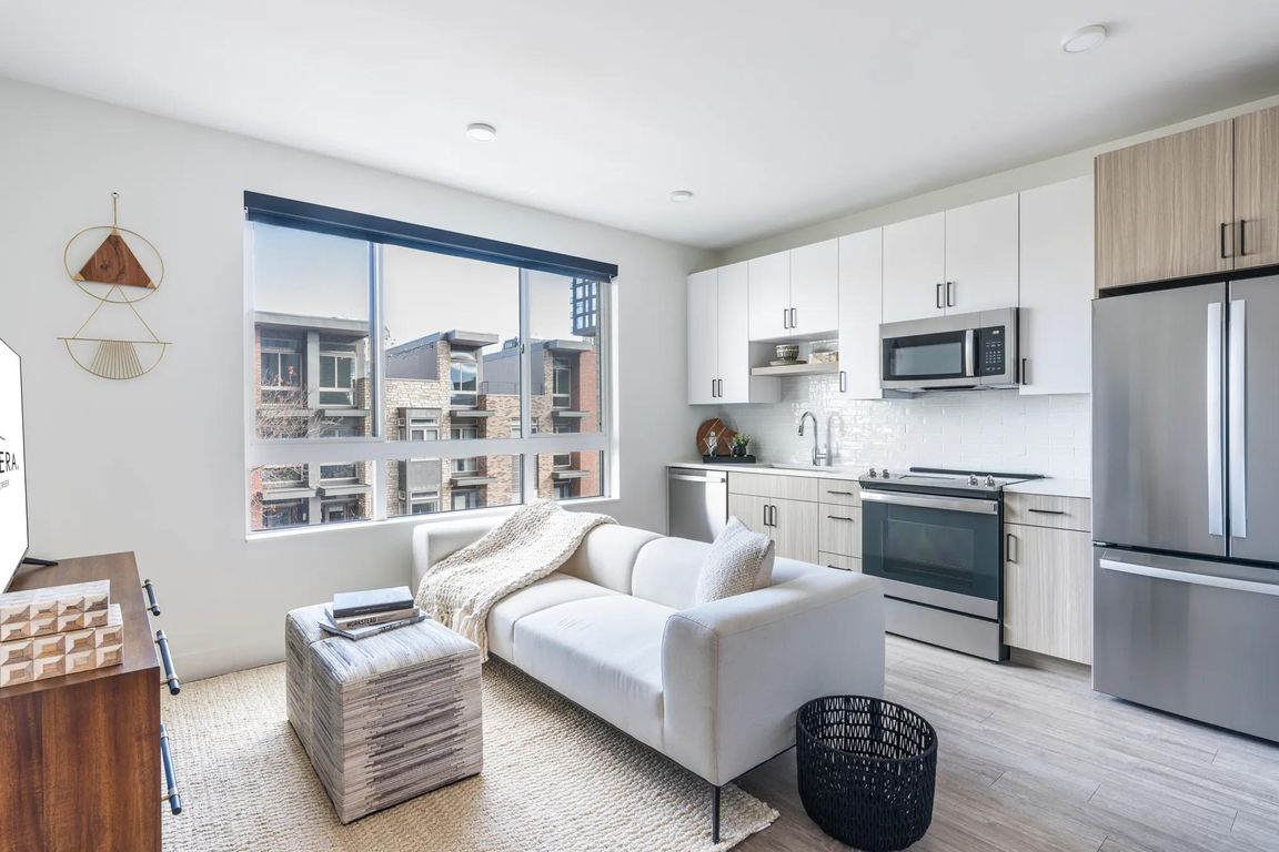 Unlock your outdoor oasis at Modera Golden Triangle. Certain Modera homes feature private balconies and patios just steps from your kitchen, offering a perfect blend of indoor-outdoor living in Denver.