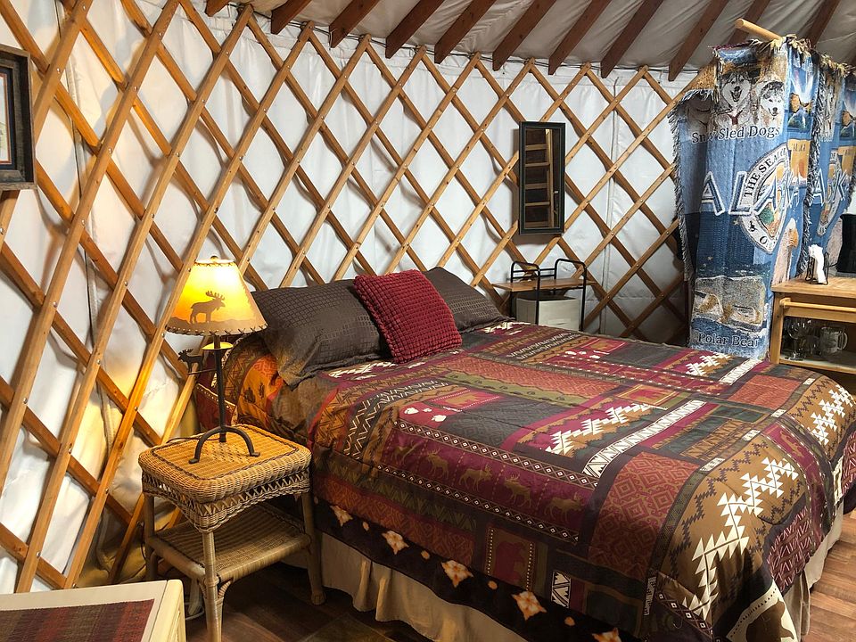 Queen Bed and Dressing area for storage and clothes