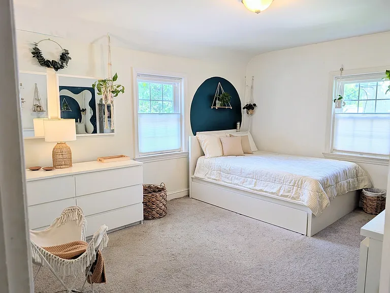 2nd spacious upstairs bedroom with a full-size bed