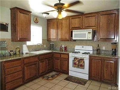 Beautifully Remodeled Kitchen with Tile Flooring