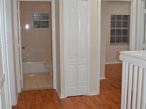 Second floor hallway to bedrooms and bathroom