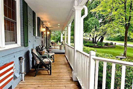 Charming front porch welcomes you...
