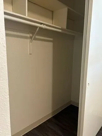Bedroom #2 closet with storage cubbies