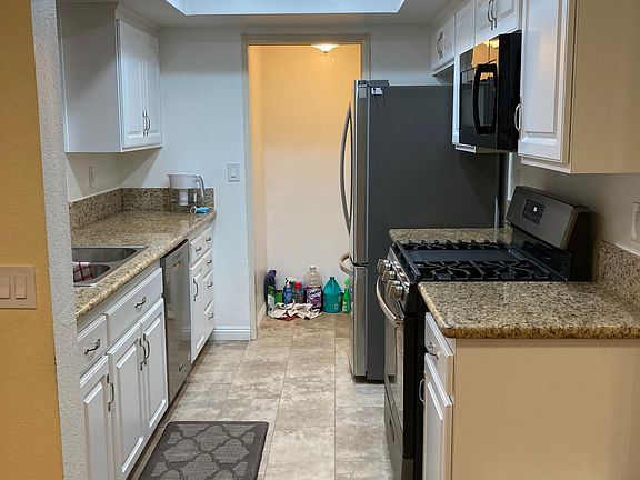 2nd image of 9449 Fairgrove Ln Unit 104