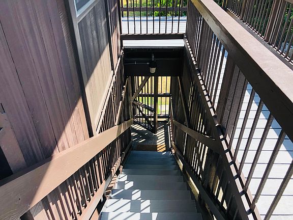 Locked secured gated entry way by stairs