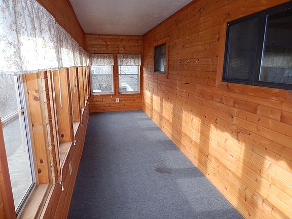 As you walk in the sliding front door there is a really nice sun porch.