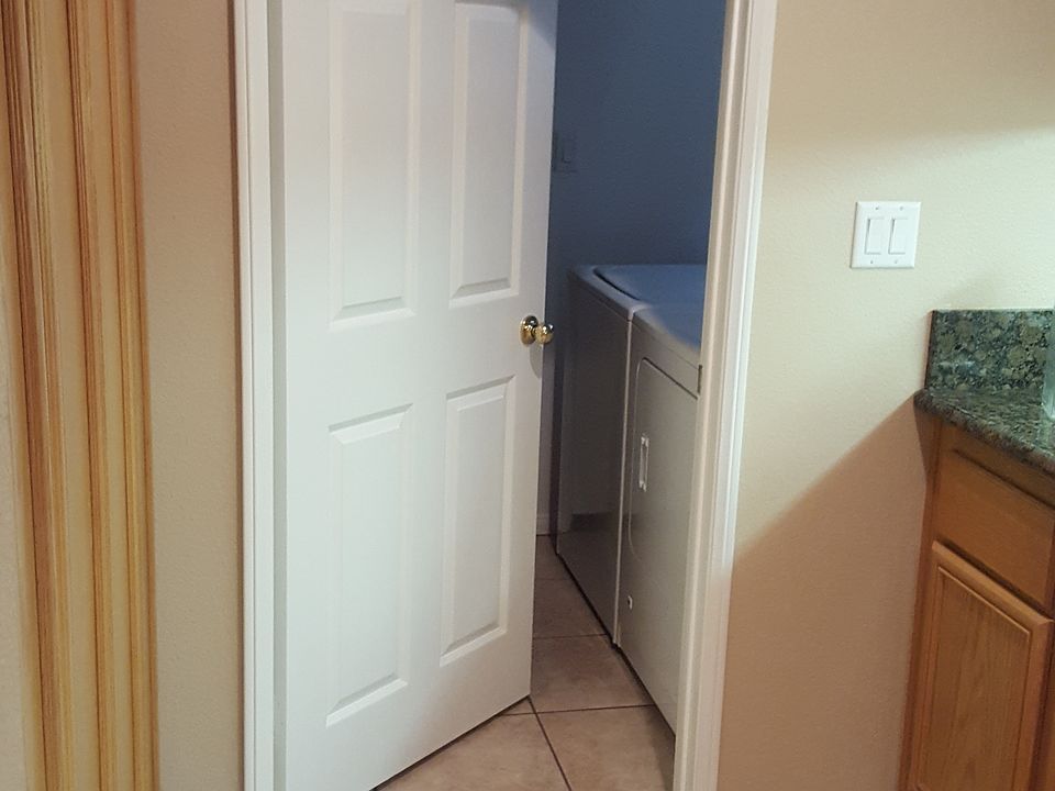 Downstairs enclosed laundry