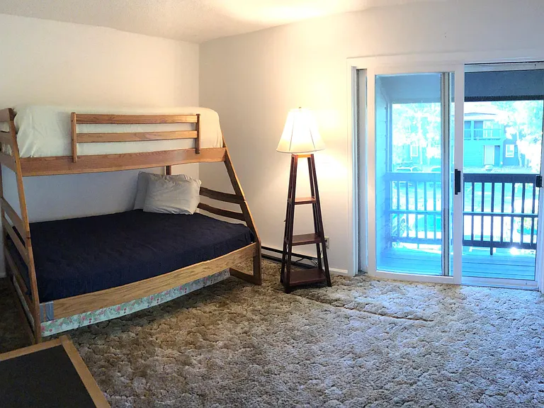 Upstairs North bedroom with balcony