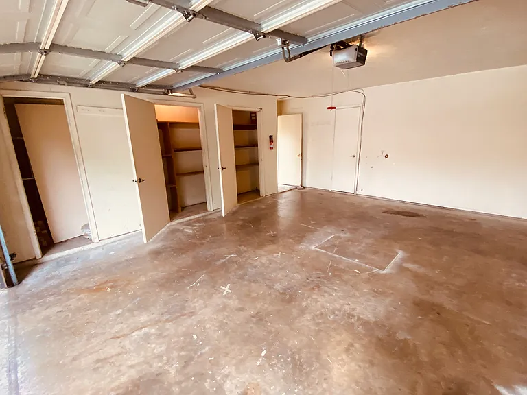 Two car garage and storage closets.