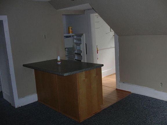 Living room looking into kitchen