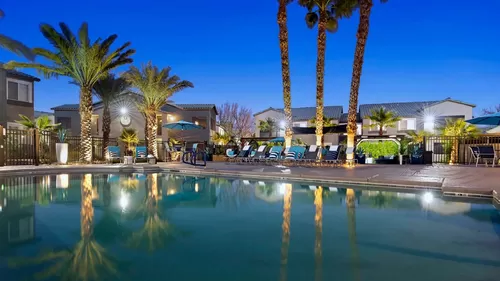 Enjoy peaceful views of our resort-style pool area at night. - Millennium East