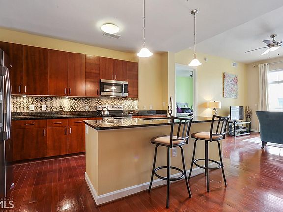 5th image of 711 Cosmopolitan Dr NE #312