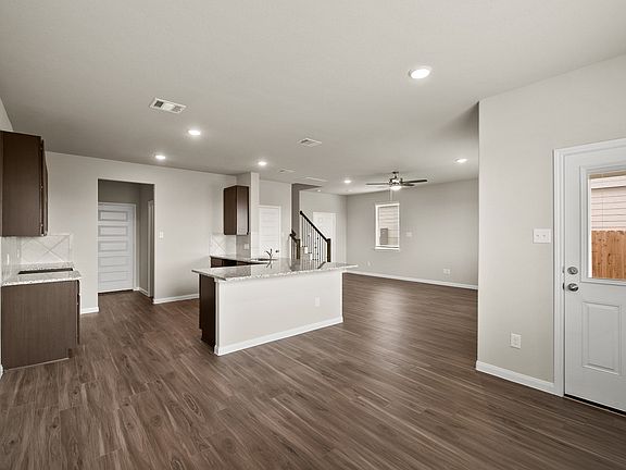 Dining Area to Kitchen and Family Room